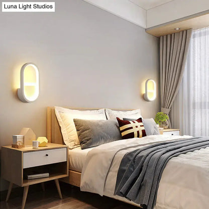 White Elliptical LED Wall Sconce by Decorbites, oval wall light, pair flanking bed on Tampa Home & Garden Store