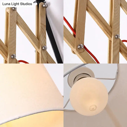 White Wall Lamp with Extendable Arm - Cylinder Fabric Shade Sconce for Living Room