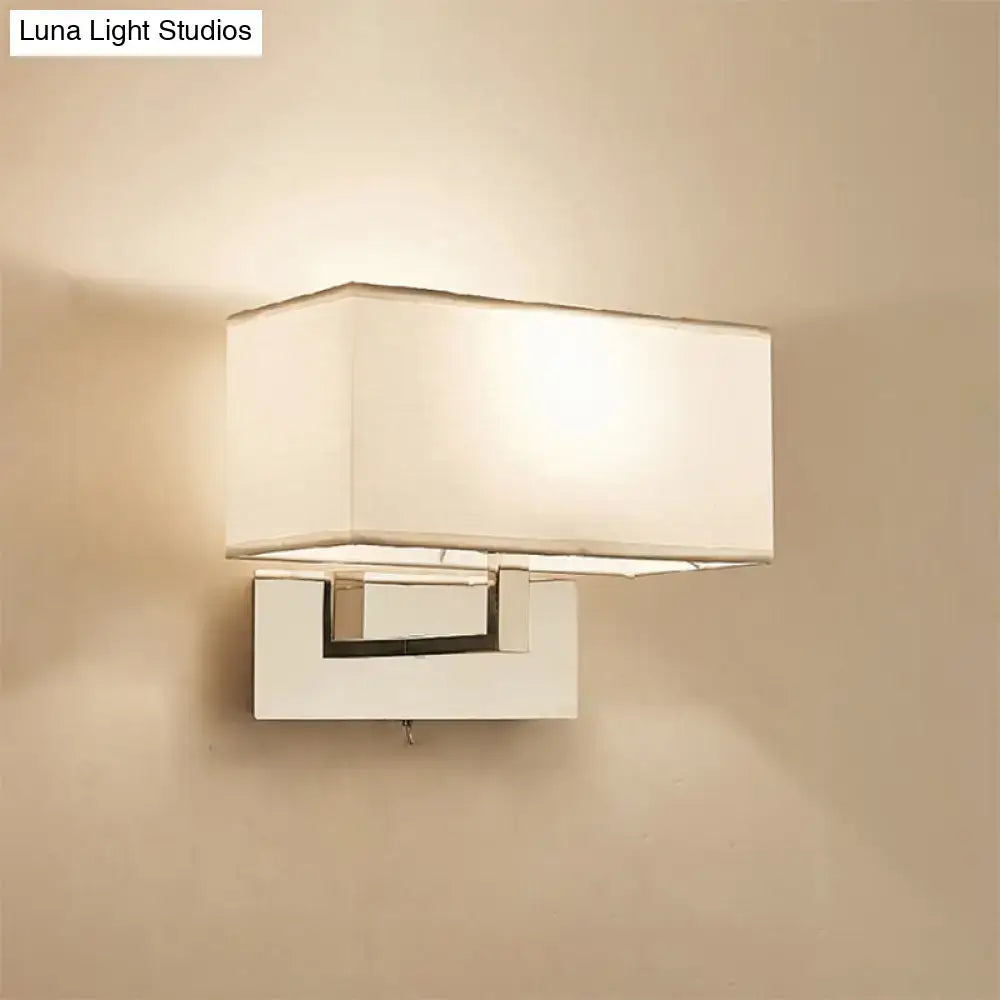 White brass wall sconce with rectangular white shade and geometric mount Decorbites on Tampa Home & Garden Store