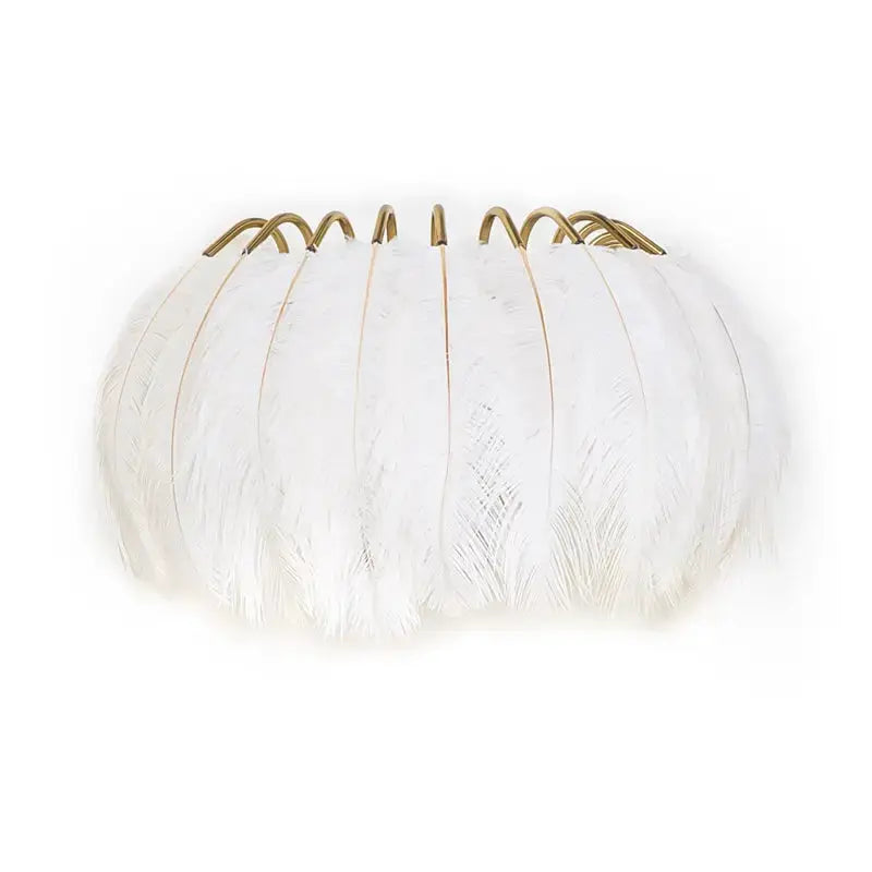 Modern white feather metal wall sconce by Decorbites, brass-gold frame, bedroom lighting on Tampa Home & Garden Store