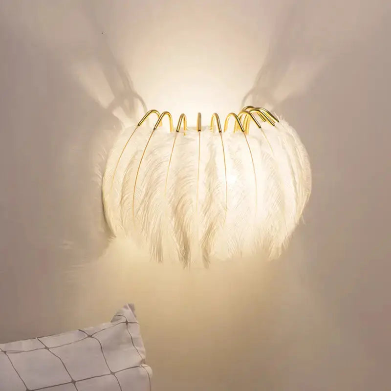 Modern white feather metal wall sconce with gold frame for bedroom lighting by Decorbites on Tampa Home & Garden Store