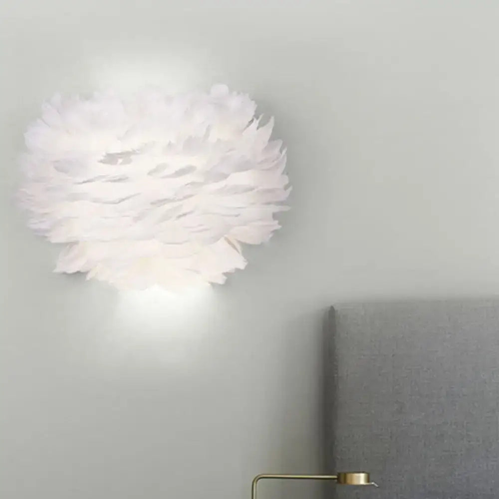 White Feather Wall Lamp Decorbites fluffy white feather shade provides warm ambient light on Tampa Home & Garden Store