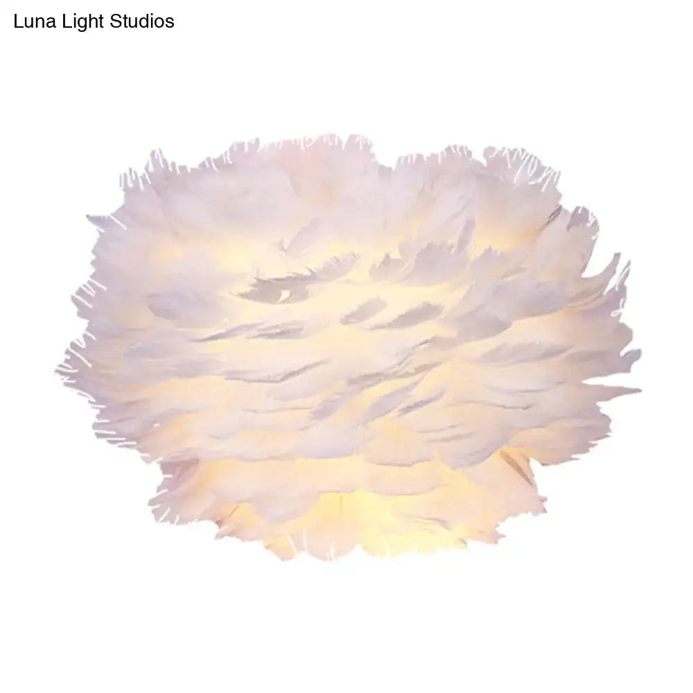 White Feather Wall Lamp by Decorbites, fluffy feather orb wall light with warm glow on Tampa Home & Garden Store