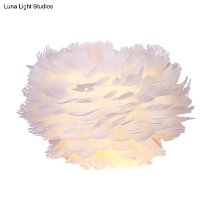 White Feather Wall Lamp by Decorbites, fluffy feather orb wall light with warm glow on Tampa Home & Garden Store