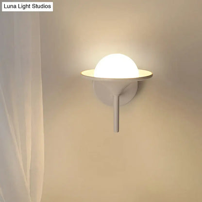 White flared glass sconce by Decorbites, wall-mounted with warm glow on Tampa Home & Garden Store