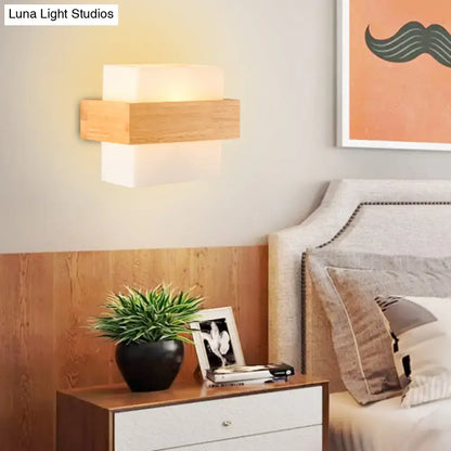 White glass wood sconce with rectangular wood block, modern bedroom wall lighting on Tampa Home & Garden Store