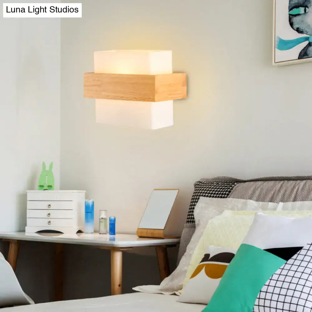 White glass wood wall sconce by Decorbites, wall-mounted with a natural wood central band on Tampa Home & Garden Store