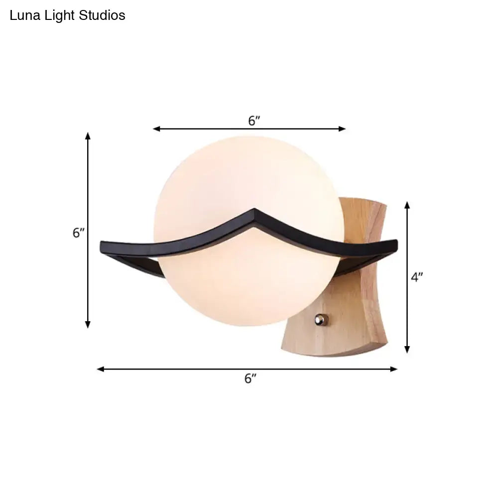 White Glass Ball Black-Accent Sconce with curved black arm and wooden mount Decorbites on Tampa Home & Garden Store