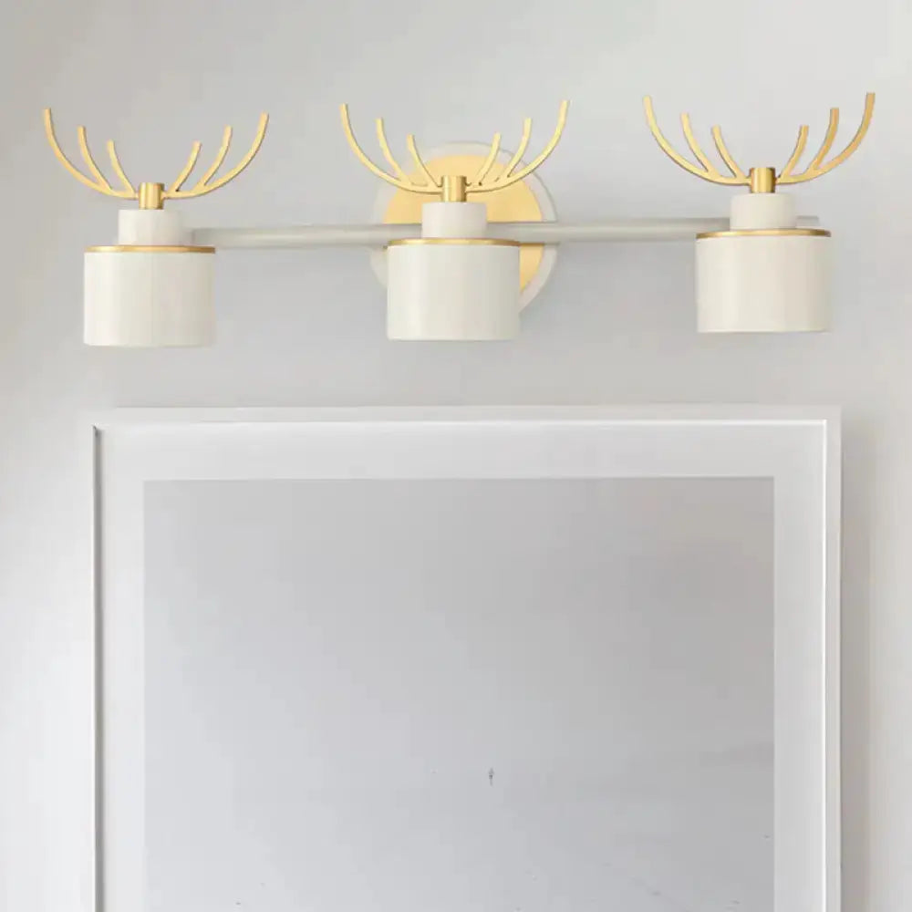 Decorbites modern white and gold antler wall light fixture with three LED shades on Tampa Home & Garden Store