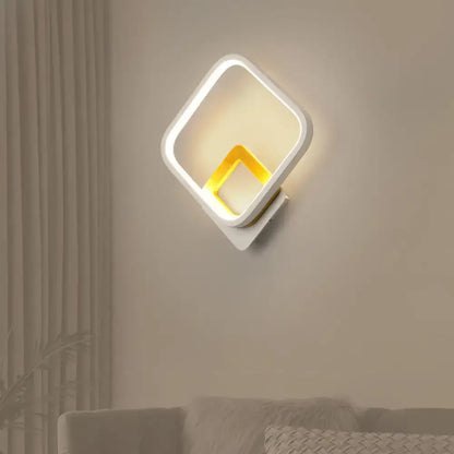 White metal minimalist LED wall sconce with double square frames and warm glow Decorbites on Tampa Home & Garden Store
