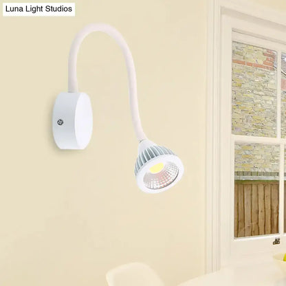 White gooseneck adjustable-arm reading sconce with round wall mount LED head by Decorbites on Tampa Home & Garden Store