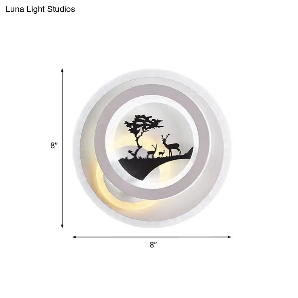 Gray Elk LED wall sconce with circular rings and deer silhouettes on a hillside 8-inch dia on Tampa Home & Garden Store