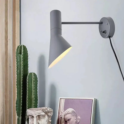 White rotating wall sconce with gray cone shade and adjustable arm Decorbites on Tampa Home & Garden Store