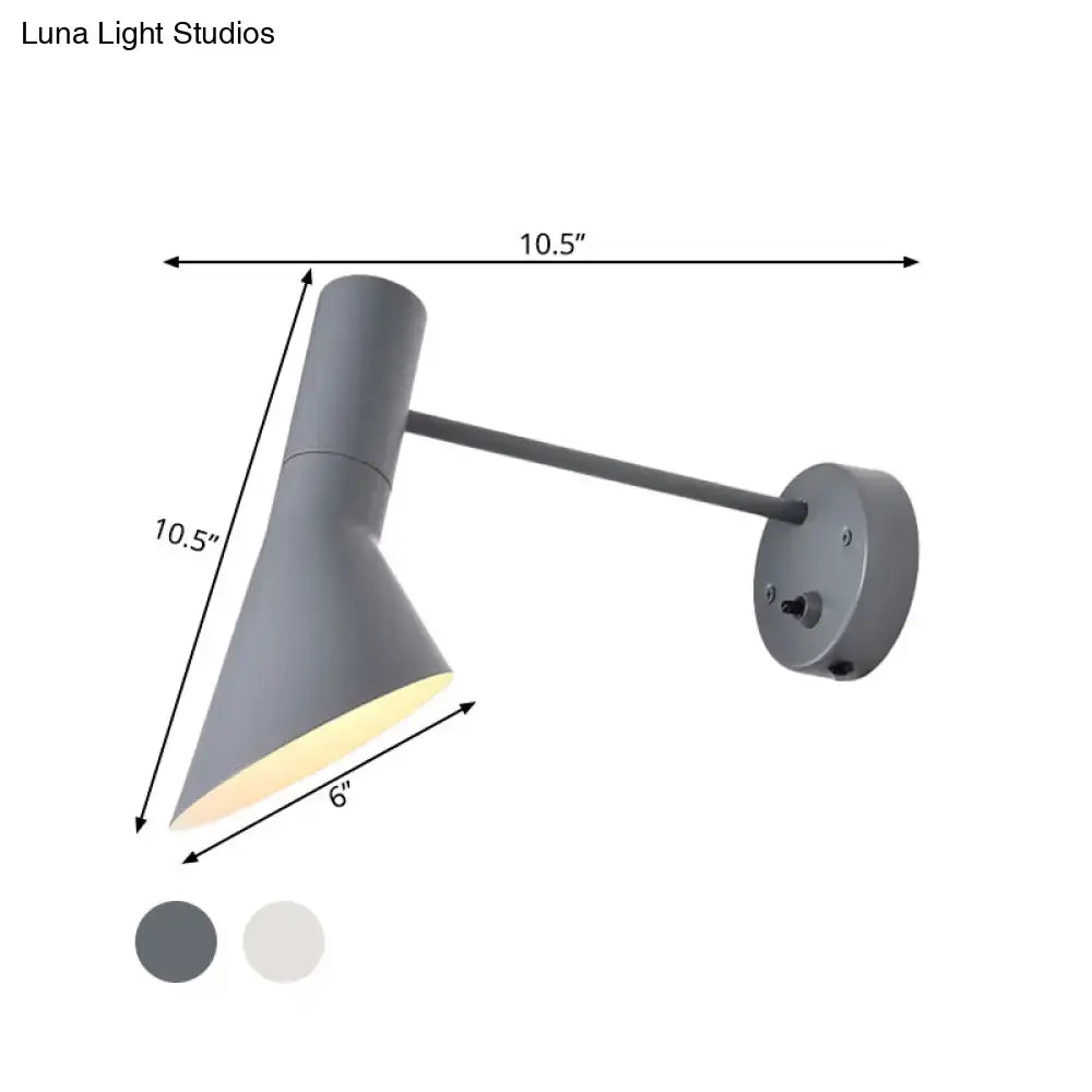 White rotating wall sconce with conical shade by Decorbites on Tampa Home & Garden Store