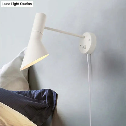 White rotating wall sconce with adjustable arm and conical shade by Decorbites on Tampa Home & Garden Store