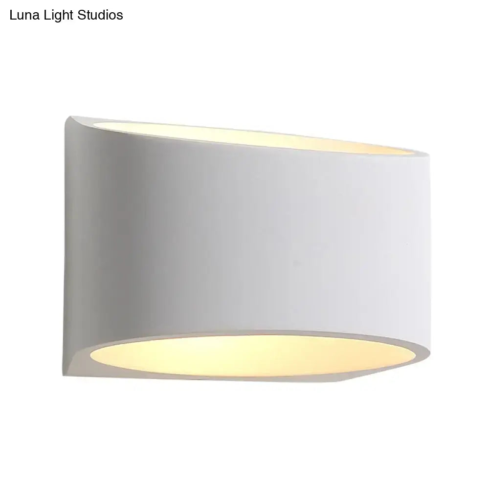 White gypsum hallway wall sconce by Decorbites, curved cylindrical design, warm light on Tampa Home & Garden Store