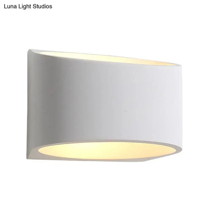 White gypsum hallway wall sconce by Decorbites, curved cylindrical design, warm light on Tampa Home & Garden Store