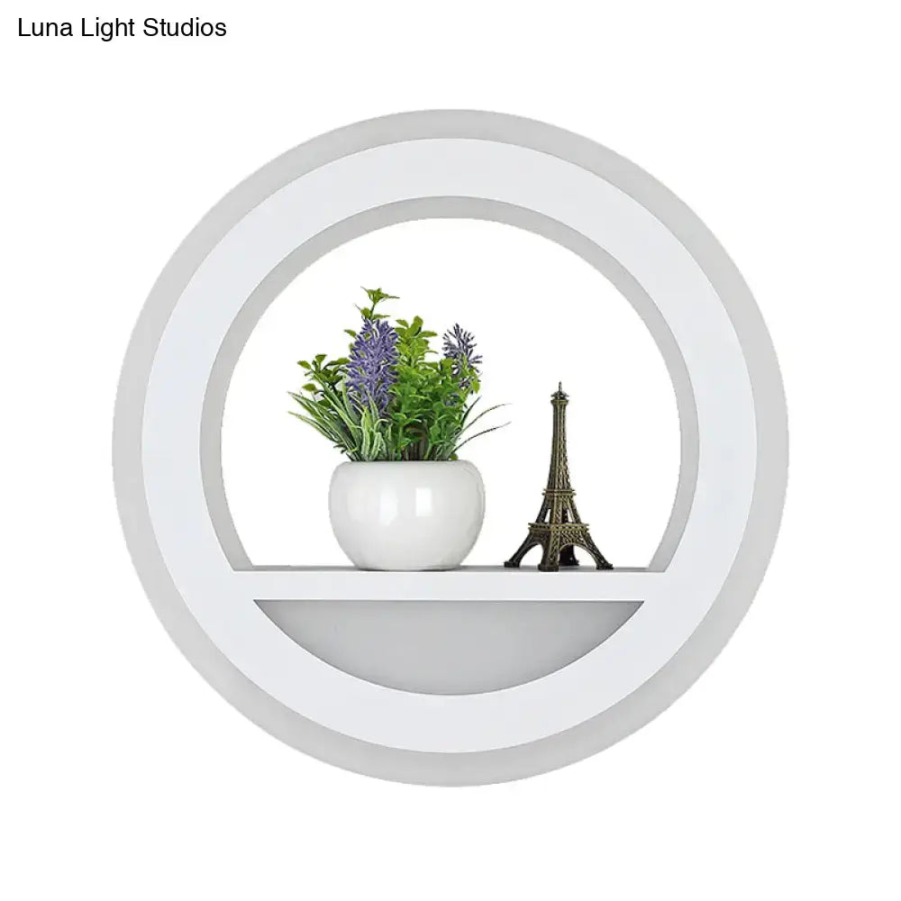White halo wall light with circular ring shelf, Decorbites, plant and Eiffel Tower decor on shelf on Tampa Home & Garden Store