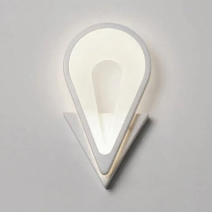 Modern white heart LED wall sconce with warm glow for a minimalist bedroom on Tampa Home & Garden Store