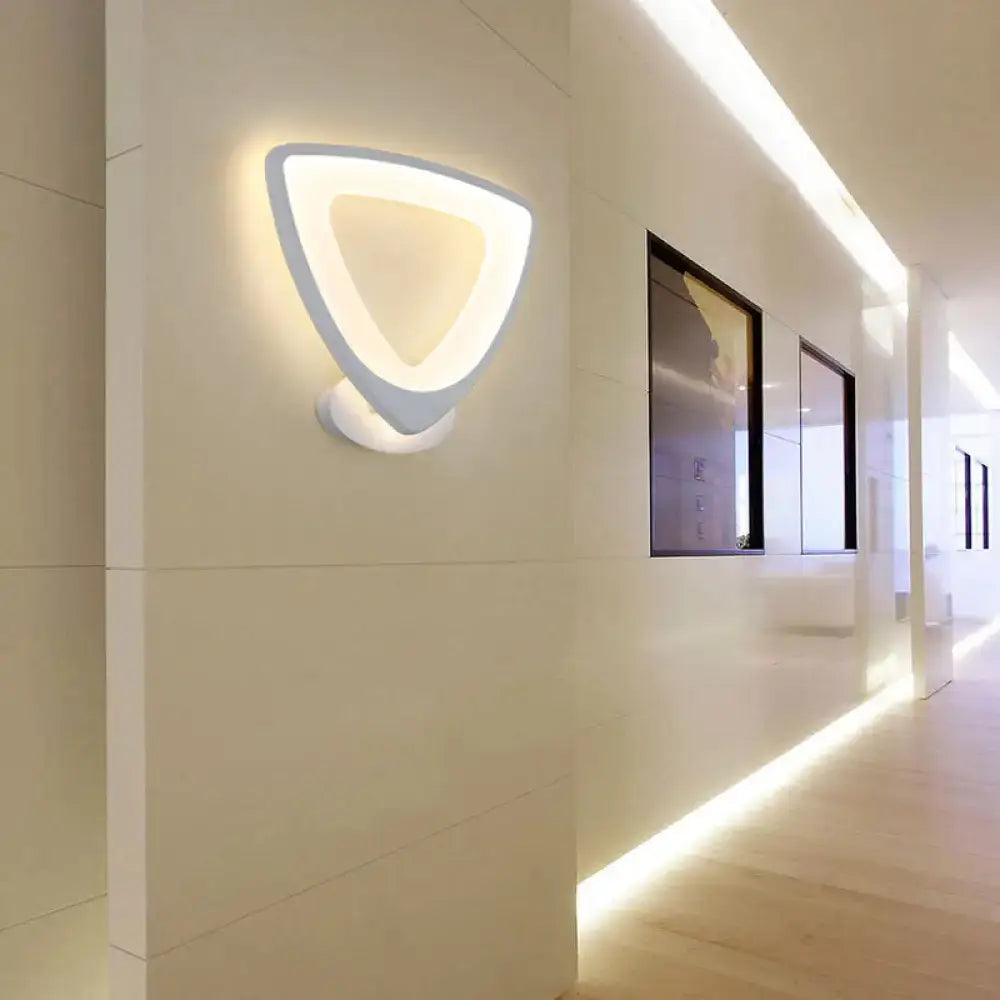 Modern white heart LED sconce by Decorbites, hollow heart frame, minimalist bedroom light on Tampa Home & Garden Store