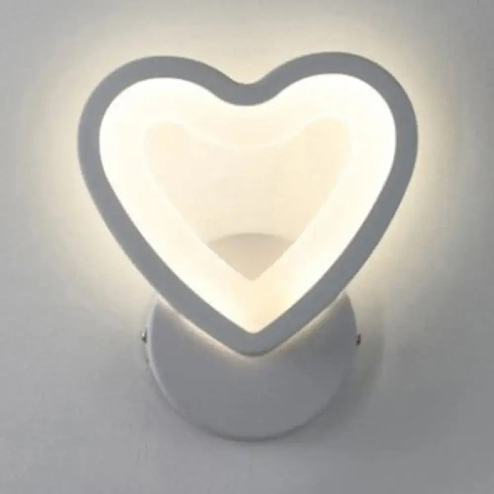 Modern white heart LED wall sconce by Decorbites, soft halo for a cozy bedroom on Tampa Home & Garden Store