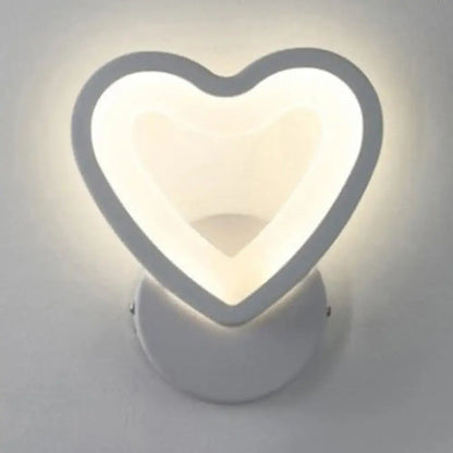 Modern white heart LED wall sconce by Decorbites, soft halo for a cozy bedroom on Tampa Home & Garden Store
