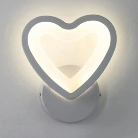 Modern white heart LED wall sconce by Decorbites, soft halo for a cozy bedroom on Tampa Home & Garden Store