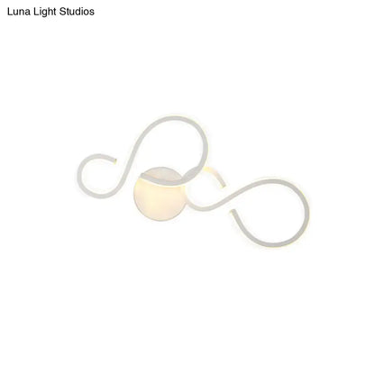 White Infinity Spiral Wall Light wall sconce with looping arms and soft central glow on Tampa Home & Garden Store