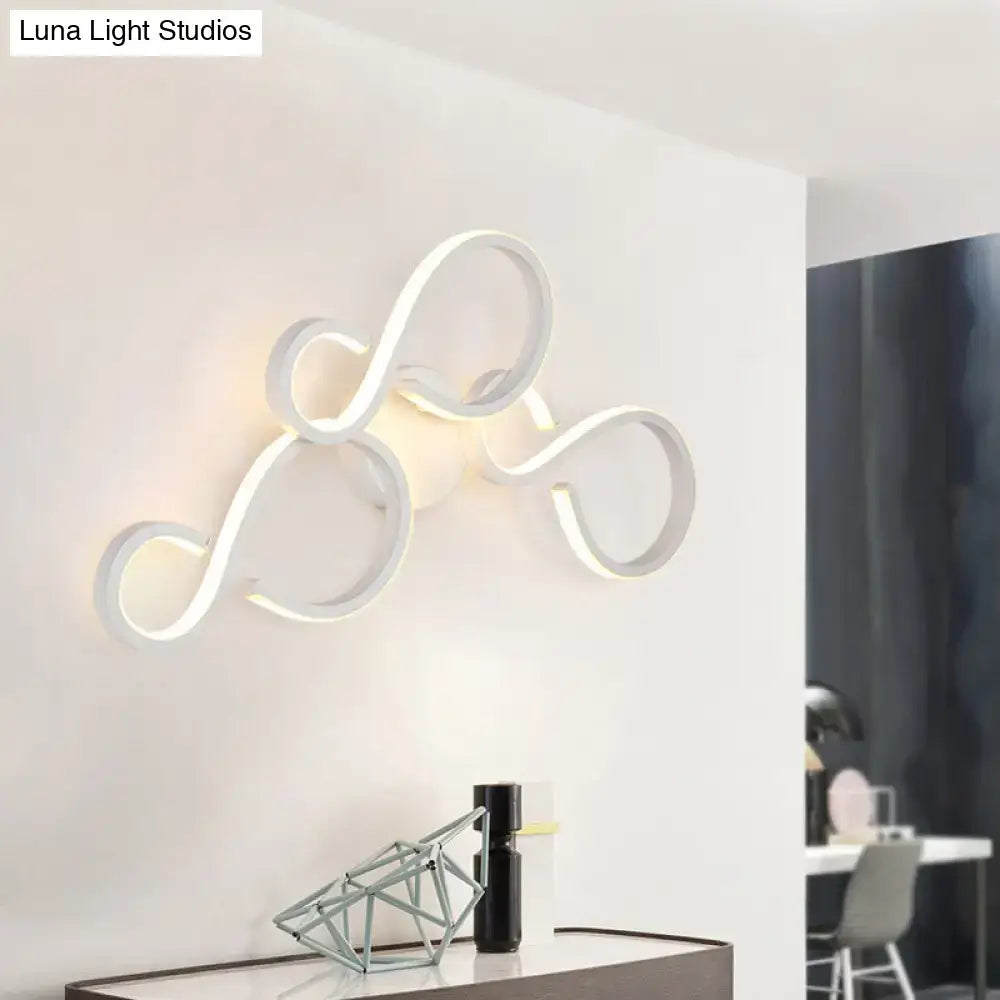White Infinity Spiral Wall Light by Decorbites, illuminated looped design on white wall on Tampa Home & Garden Store