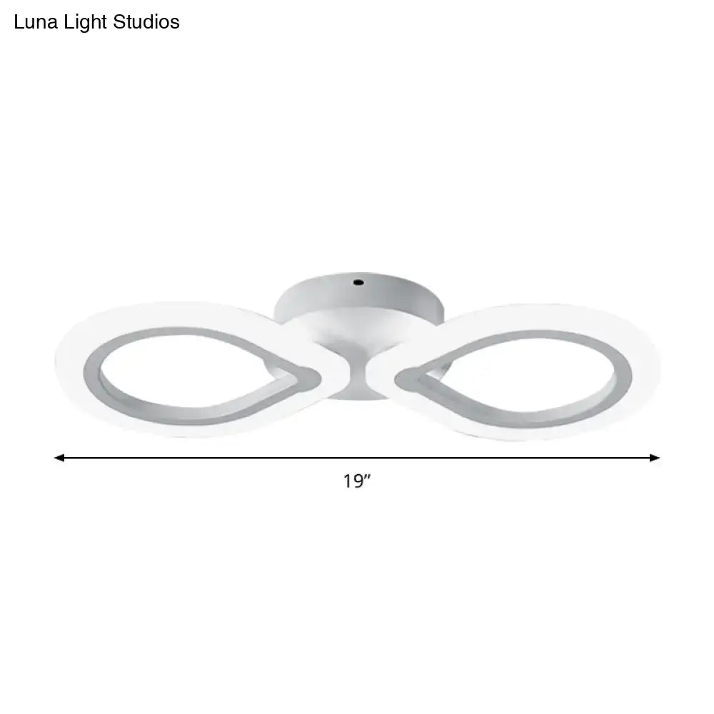 White Interlocking Ring Wall Light by Decorbites, dual loop design with modern white finish on Tampa Home & Garden Store