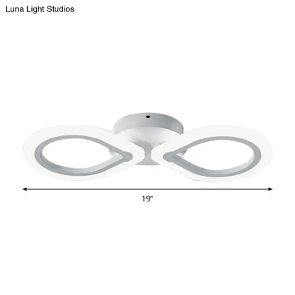 White Interlocking Ring Wall Light by Decorbites, dual loop design with modern white finish on Tampa Home & Garden Store