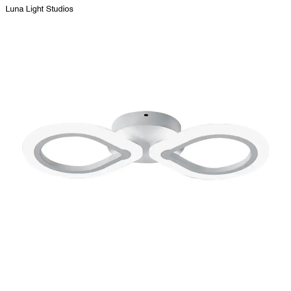 White Interlocking Ring Wall Light by Decorbites with dual-loop design on Tampa Home & Garden Store