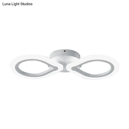 White Interlocking Ring Wall Light by Decorbites with dual-loop design on Tampa Home & Garden Store