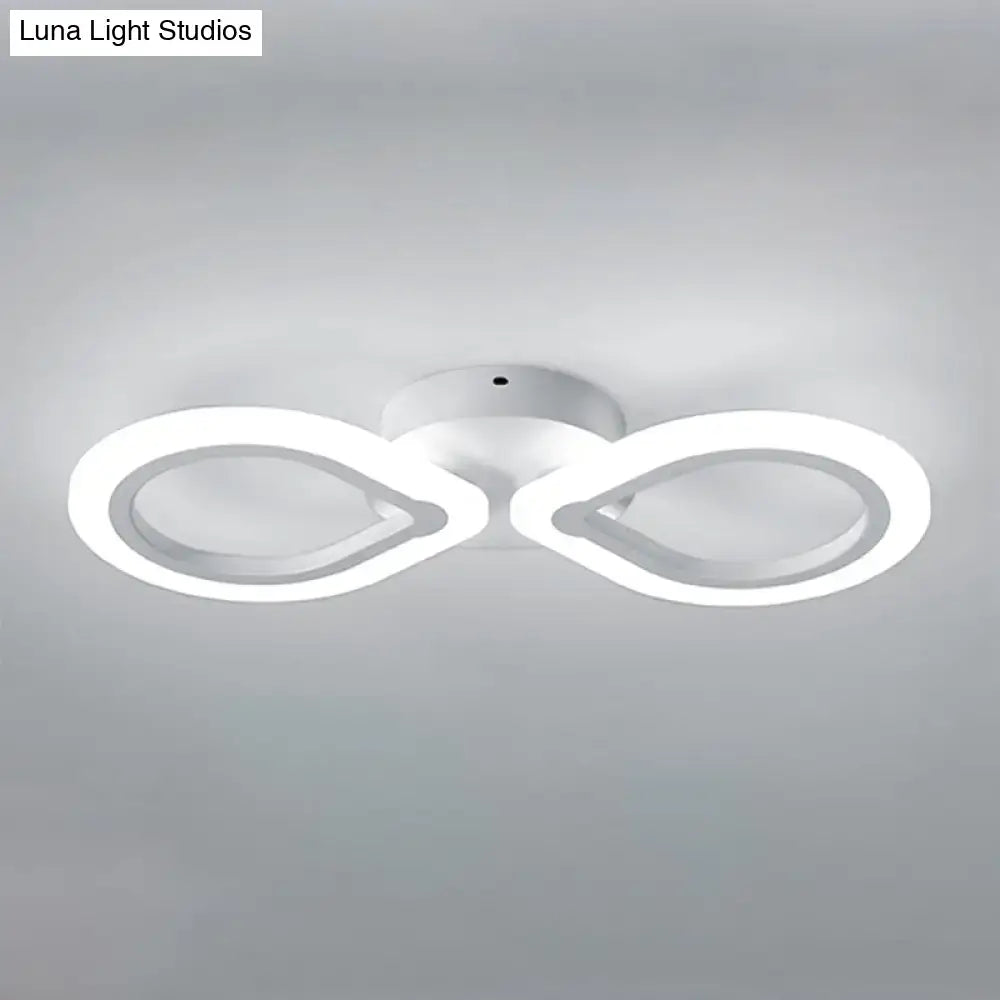 White interlocking ring wall light fixture with dual circular LED rings on Tampa Home & Garden Store