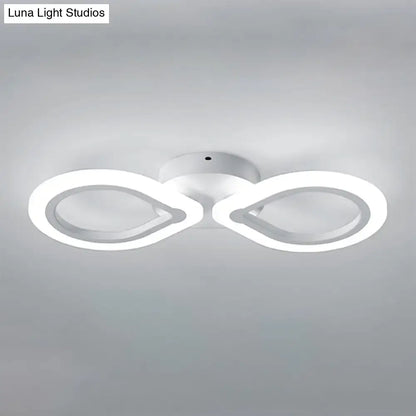 White interlocking ring wall light fixture with dual circular LED rings on Tampa Home & Garden Store
