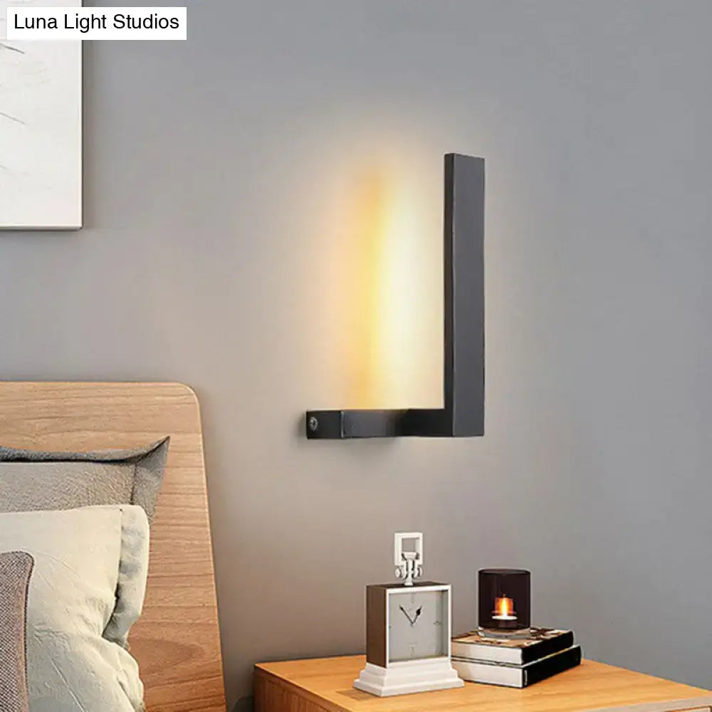 White L-Shaped Wall Sconce by Decorbites with warm glow on gray wall on Tampa Home & Garden Store