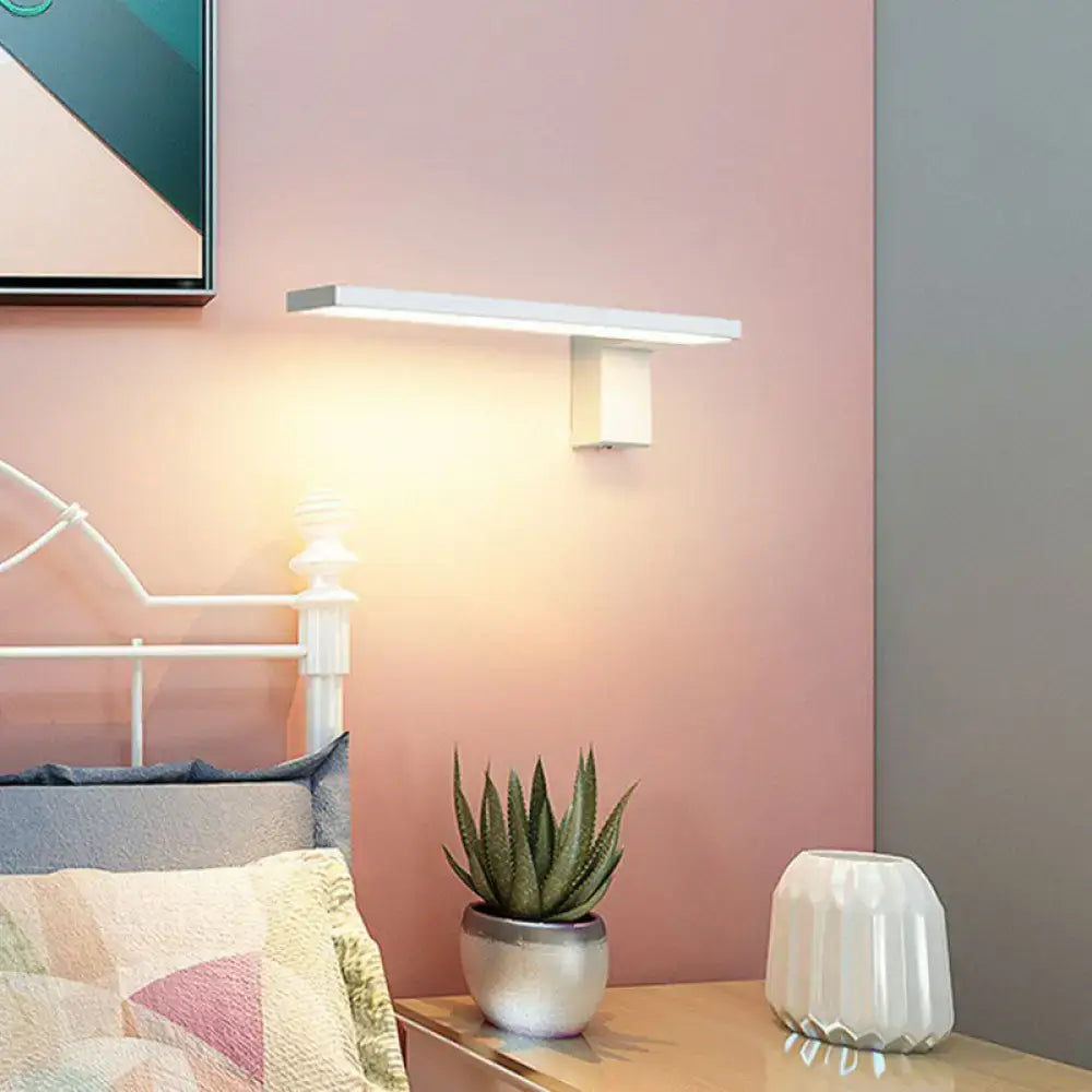 White L-shaped wall sconce by Decorbites, modern white metal bedside light on Tampa Home & Garden Store