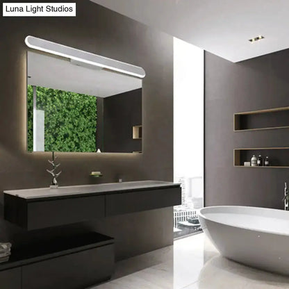 Modern white LED wall light for bathroom mirror above dark modern bath Decorbites on Tampa Home & Garden Store