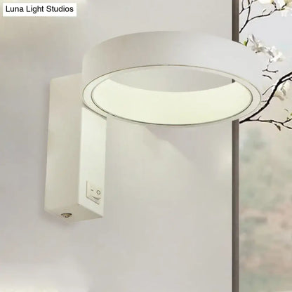 White LED direct-wired wall sconce with circular halo light and rectangular backplate on Tampa Home & Garden Store