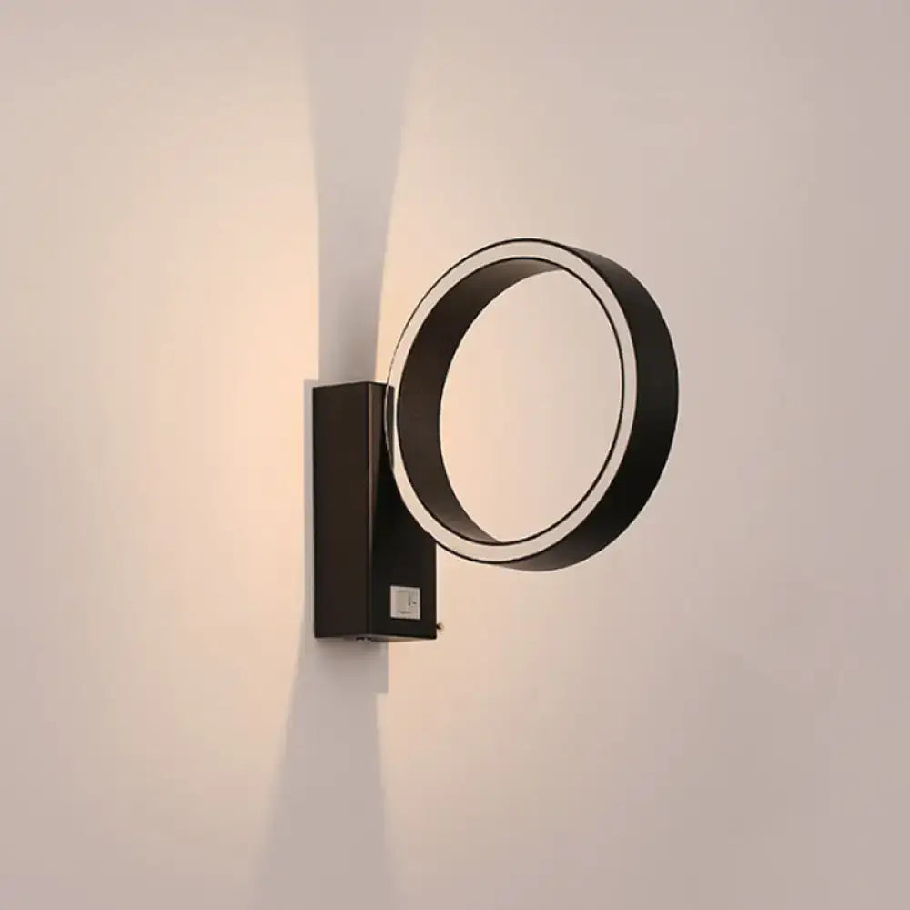 White LED Direct-Wired Wall Sconce by Decorbites, black circular ring design, wall-mounted on Tampa Home & Garden Store