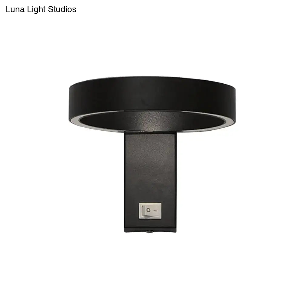 White LED Direct-Wired Wall Sconce on black metal backplate with circular shade on Tampa Home & Garden Store