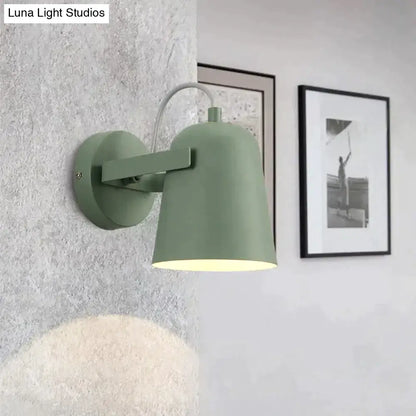 White Matte Adjustable Wall Lamp wall sconce with curved arm and cone shade on textured wall by Decorbites on Tampa Home & Garden Store