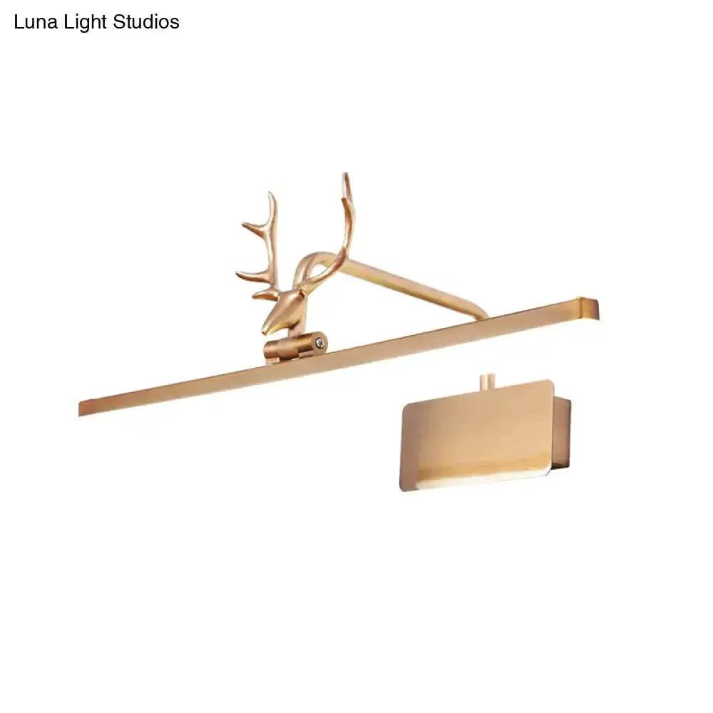 Gold-tone antler vanity wall lamp with horizontal bar for bathroom on Tampa Home & Garden Store