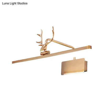 Gold-tone antler vanity wall lamp with horizontal bar for bathroom on Tampa Home & Garden Store