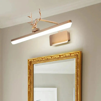 Modern white metal antler vanity wall lamp for bathroom with brass antler accents on Tampa Home & Garden Store