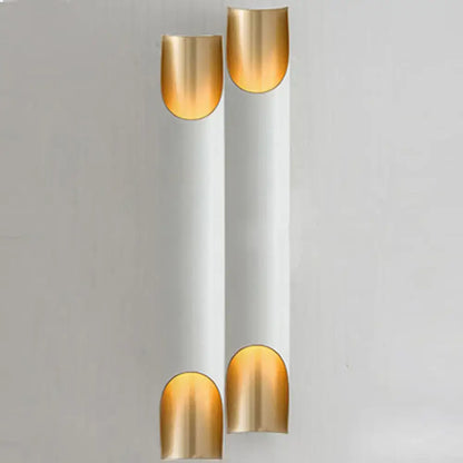 Pair of white metal wall sconces with gold-toned caps by Decorbites on Tampa Home & Garden Store