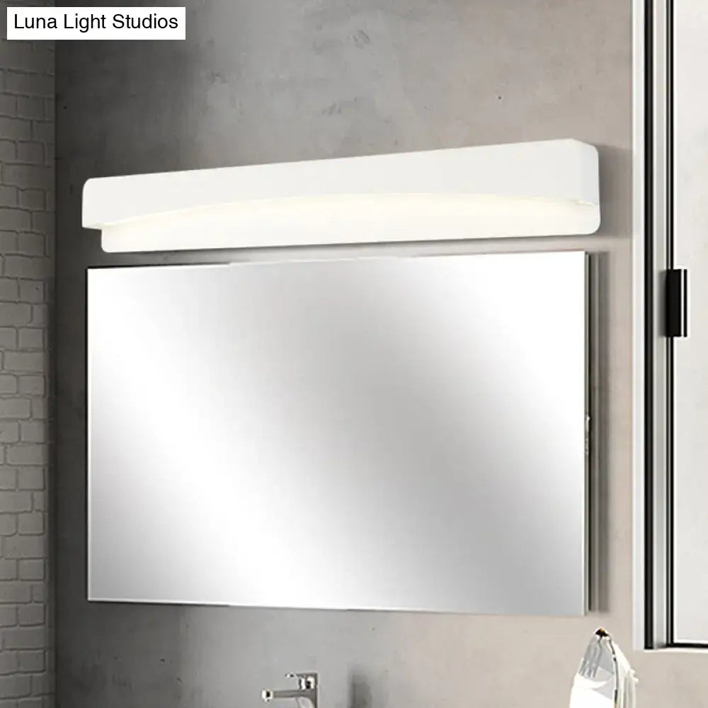 White LED rectangular wall sconce by Decorbites with frosted diffuser above mirror on Tampa Home & Garden Store