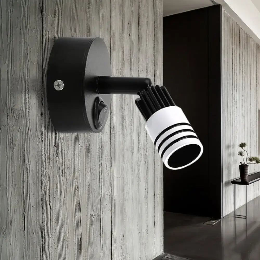 White metal wall spotlight by Decorbites with black mount and adjustable arm on Tampa Home & Garden Store