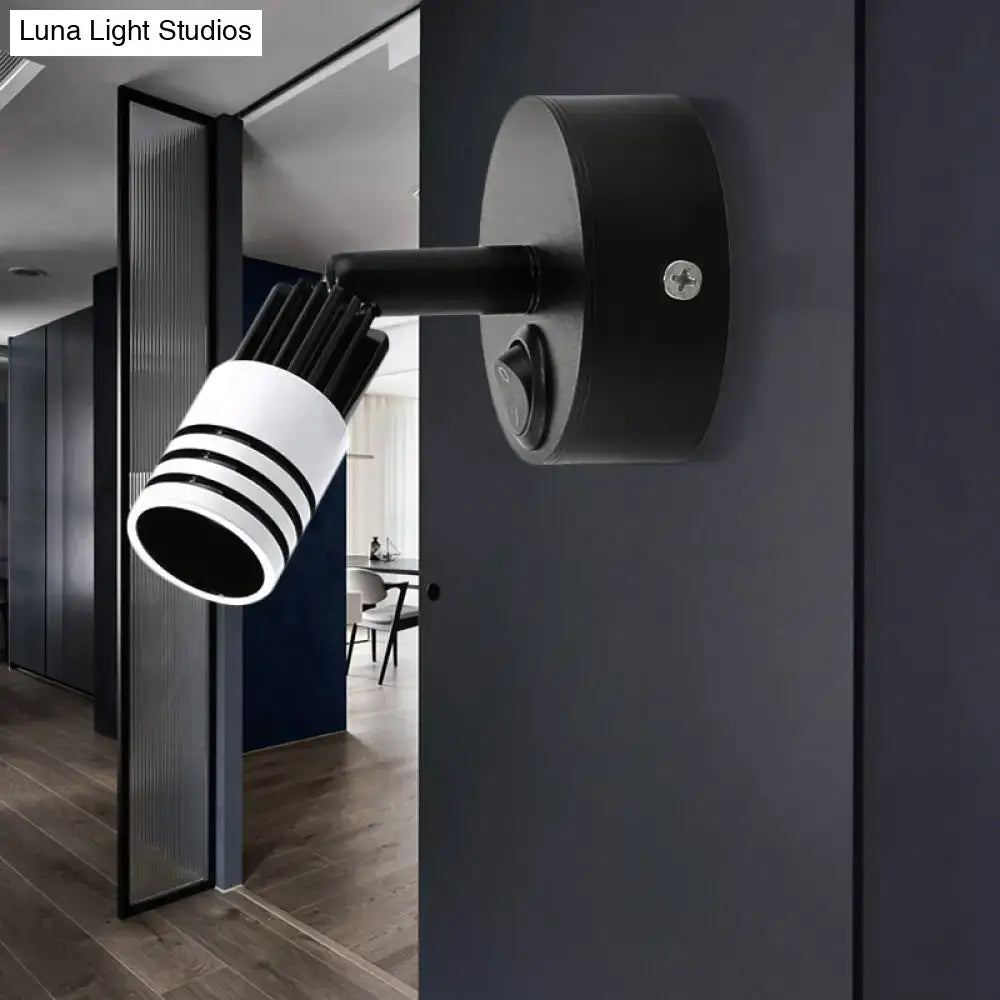 White metal wall spotlight by Decorbites with black striped cylindrical head on Tampa Home & Garden Store