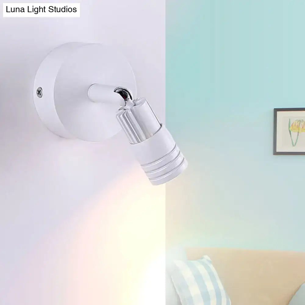 White metal wall spotlight with adjustable cylindrical head on round wall mount Decorbites on Tampa Home & Garden Store